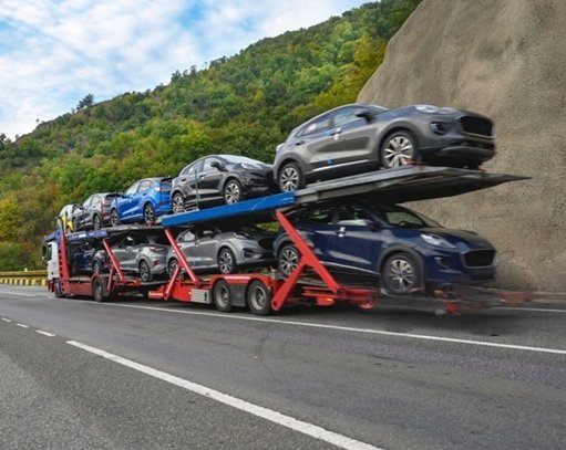 Car hauler loaded with 9 vehicles ready for Baltimore car shipping